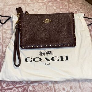 Coach Oxblood Studded Wristlet